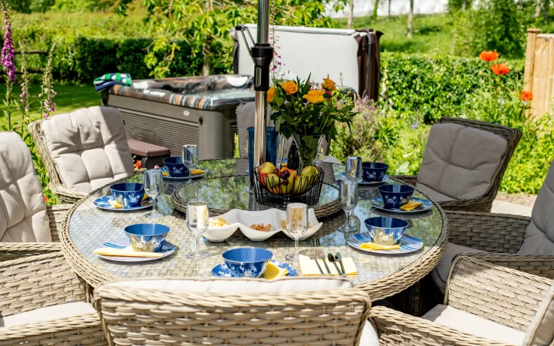 Outdoor dining area with views across the garden, hot tub and surrounding countryside, Old Barn House