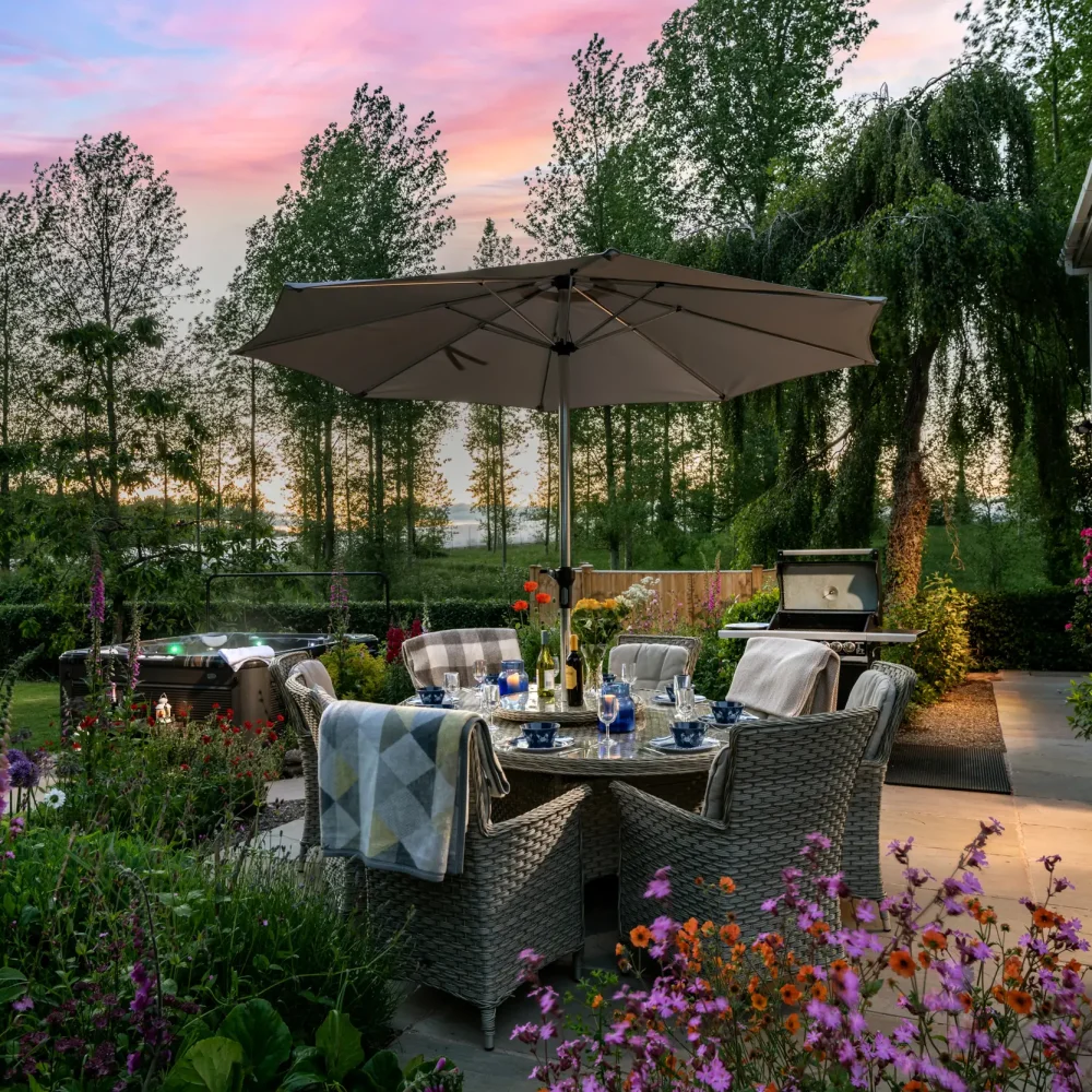 Alfresco dining at dusk, Old Barn House