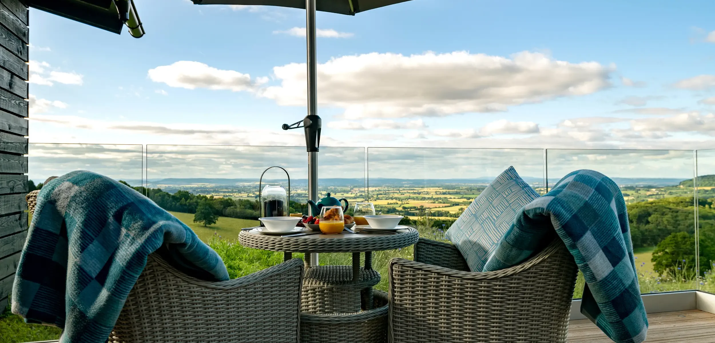 Outdoor dining area on the private decking with beautiful countryside views at Kestrel Retreat