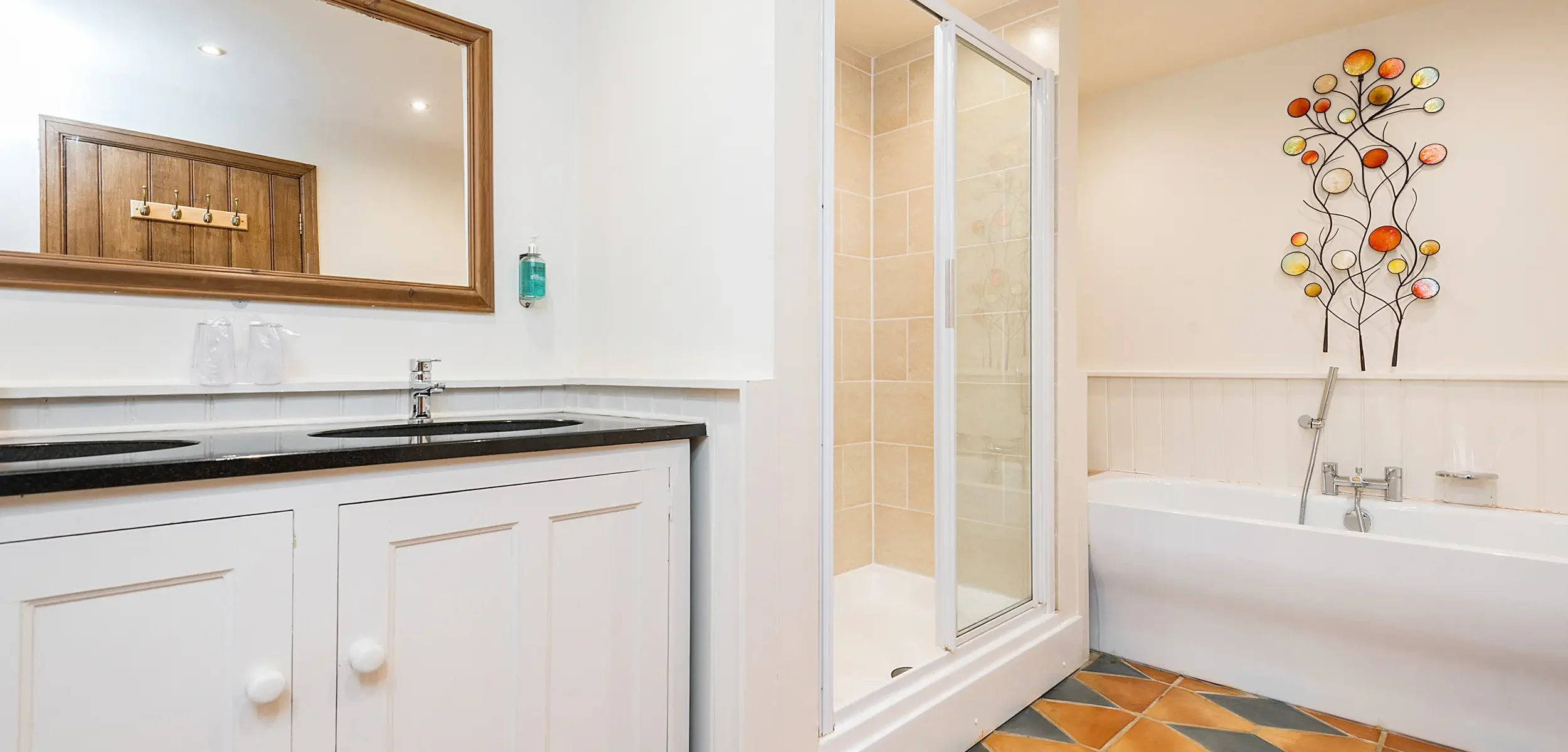 Oak Tree Suite En-Suite, Double sink, shower and separate bath. Penblaith Barn.